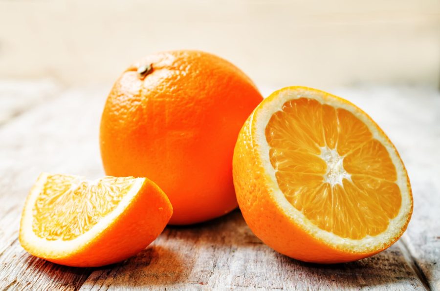 oranges on a white background wood. toning. selective Focus