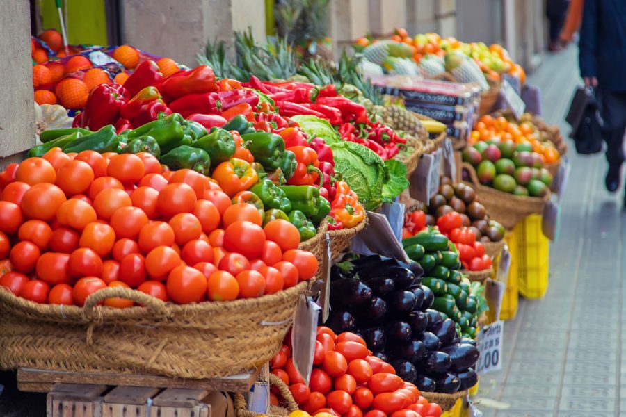 Market stalls with vegetables and fruits. Selective focus. Food.